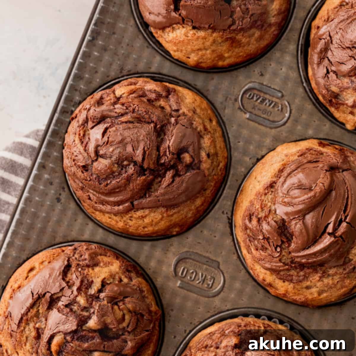 Nutella Swirl Banana Muffins 1 featured 13518
