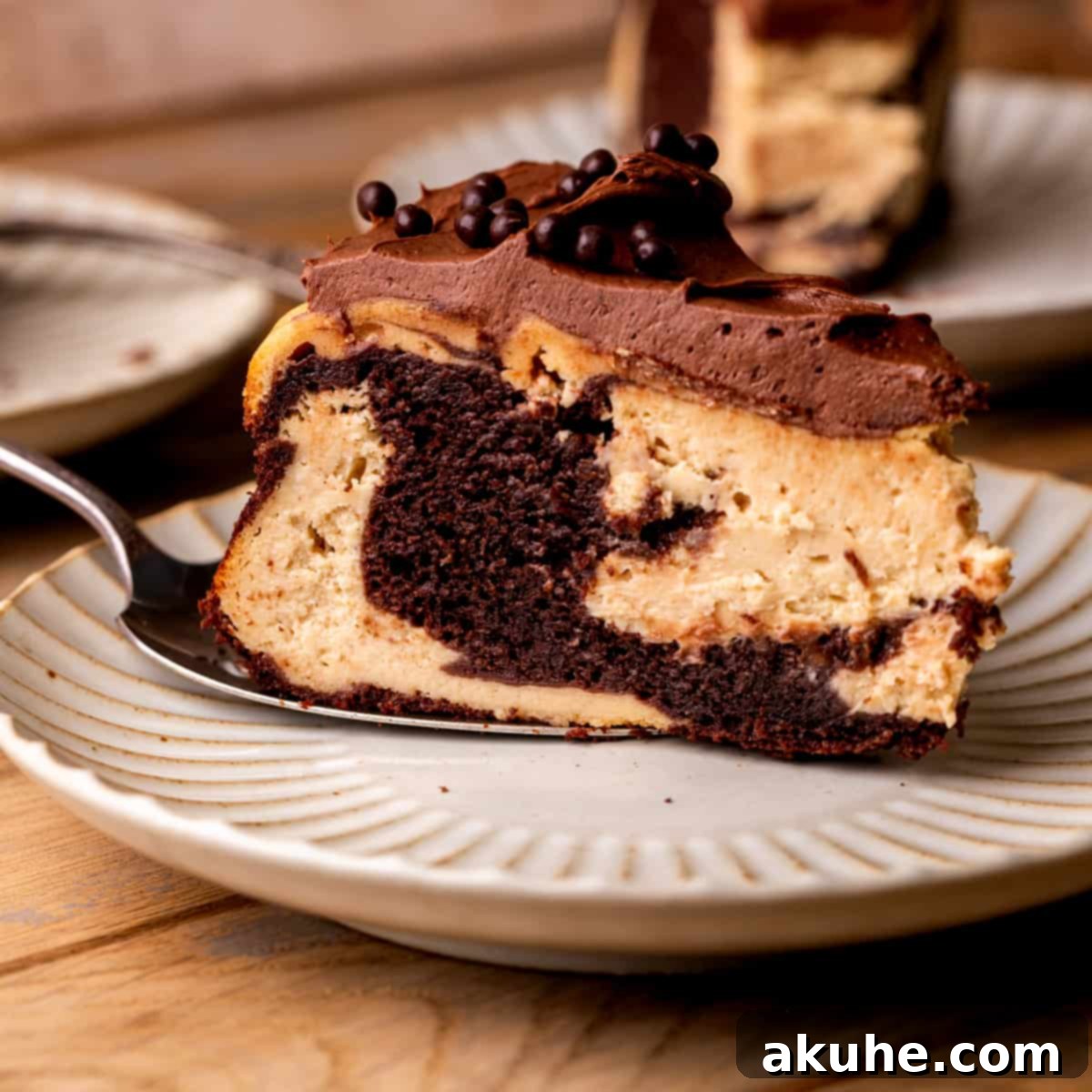 Ultimate Peanut Butter Chocolate Cheesecake 1 featured 23113