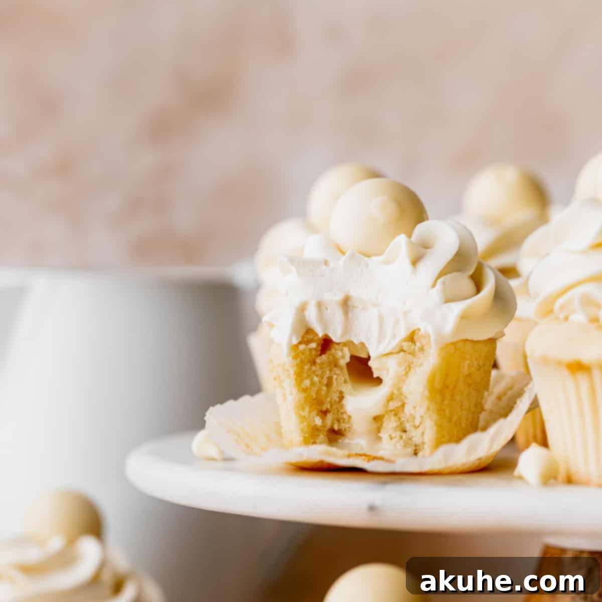 Decadent White Chocolate Cupcakes 1 featured 7272