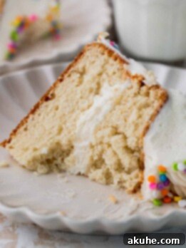 Vanilla Bean Mini Cakes 12 One slice of mini vanilla cake with a bite missing.