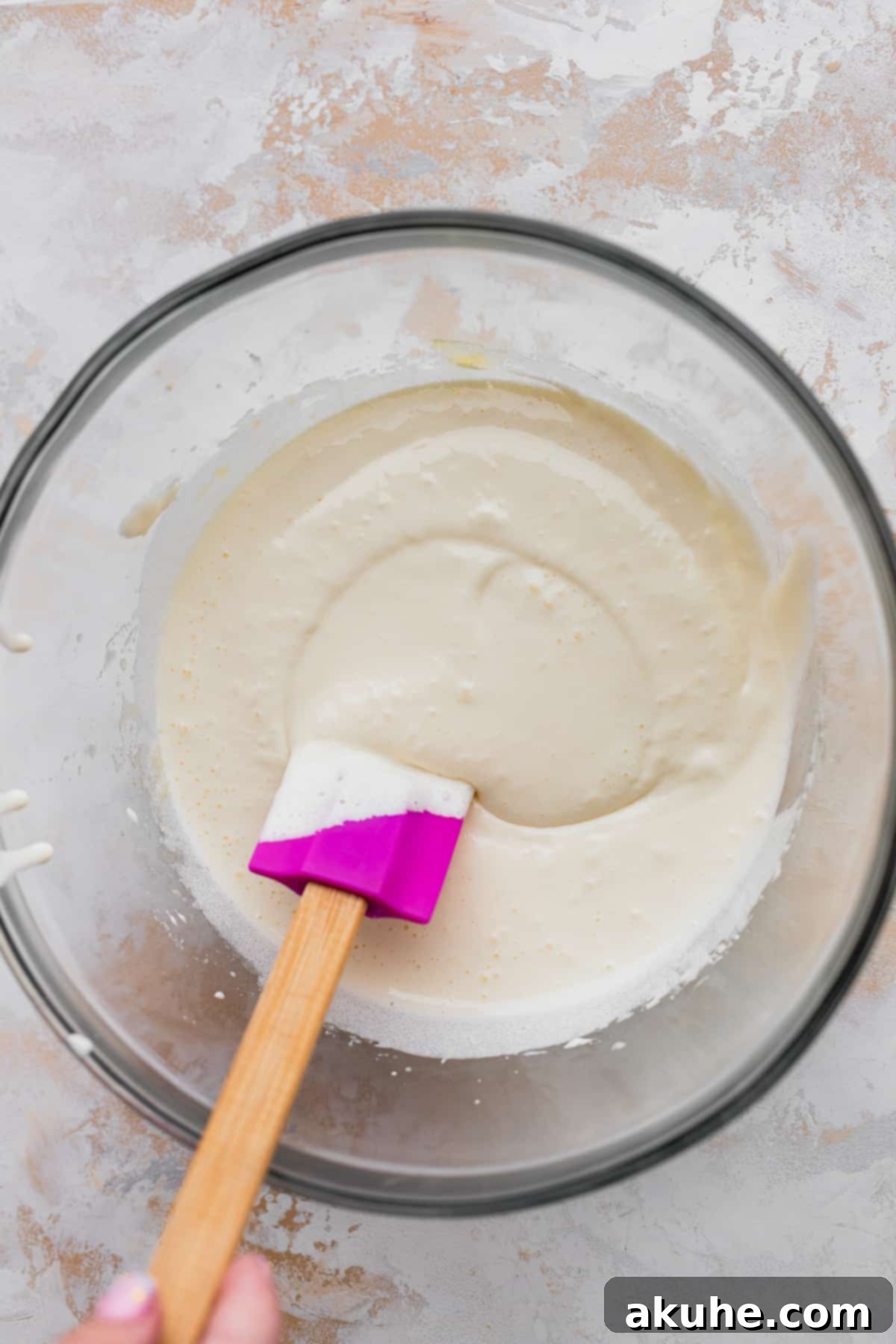 Decadent Oreo Cheesecake Brownies 6 Wet ingredients in a bowl.