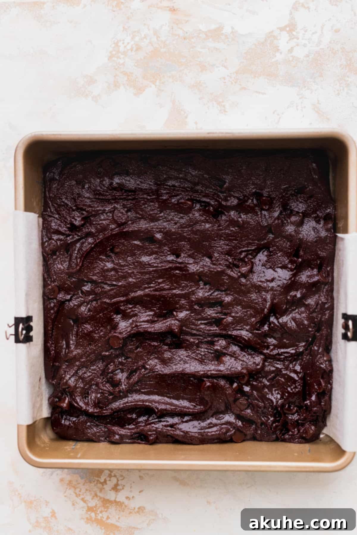 Decadent Oreo Cheesecake Brownies 8 Brownie batter in a tin.