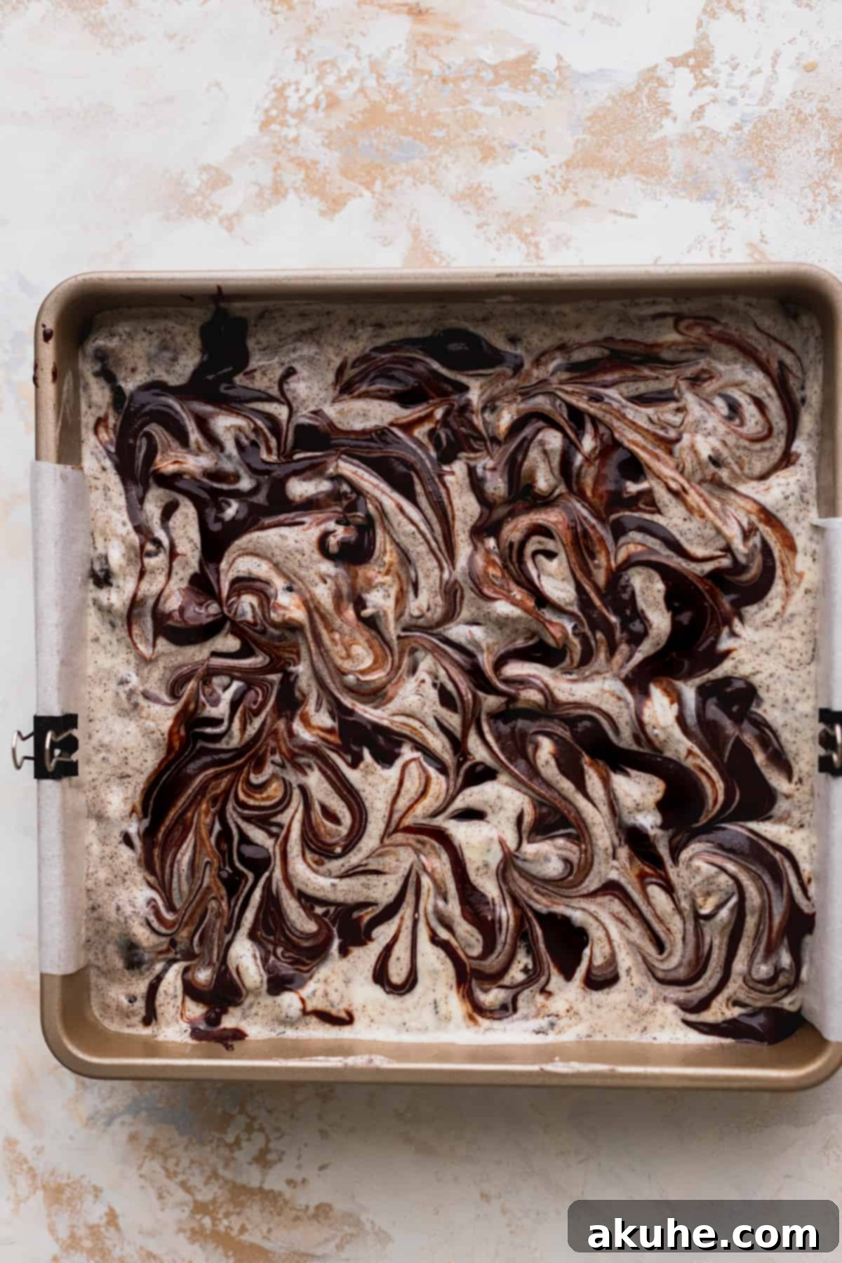 Decadent Oreo Cheesecake Brownies 10 Brownie batter swirled on top of cheesecake batter.
