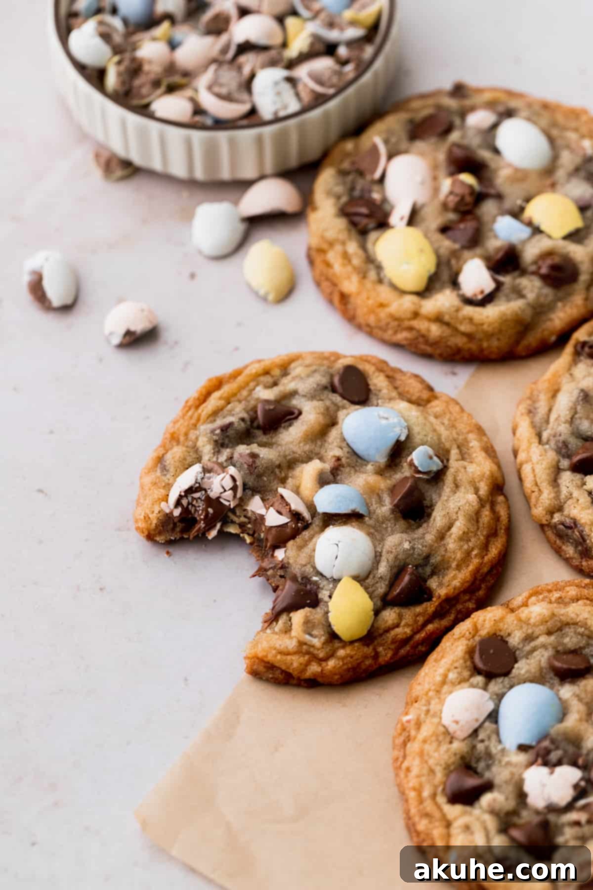 Delicious Mini Egg Cookies 3 A mini egg cookie with a bite taken out, showing its chewy interior.