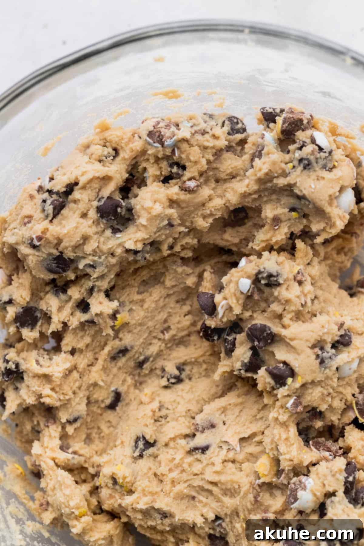Delicious Mini Egg Cookies 6 Chilled cookie dough in a glass bowl.