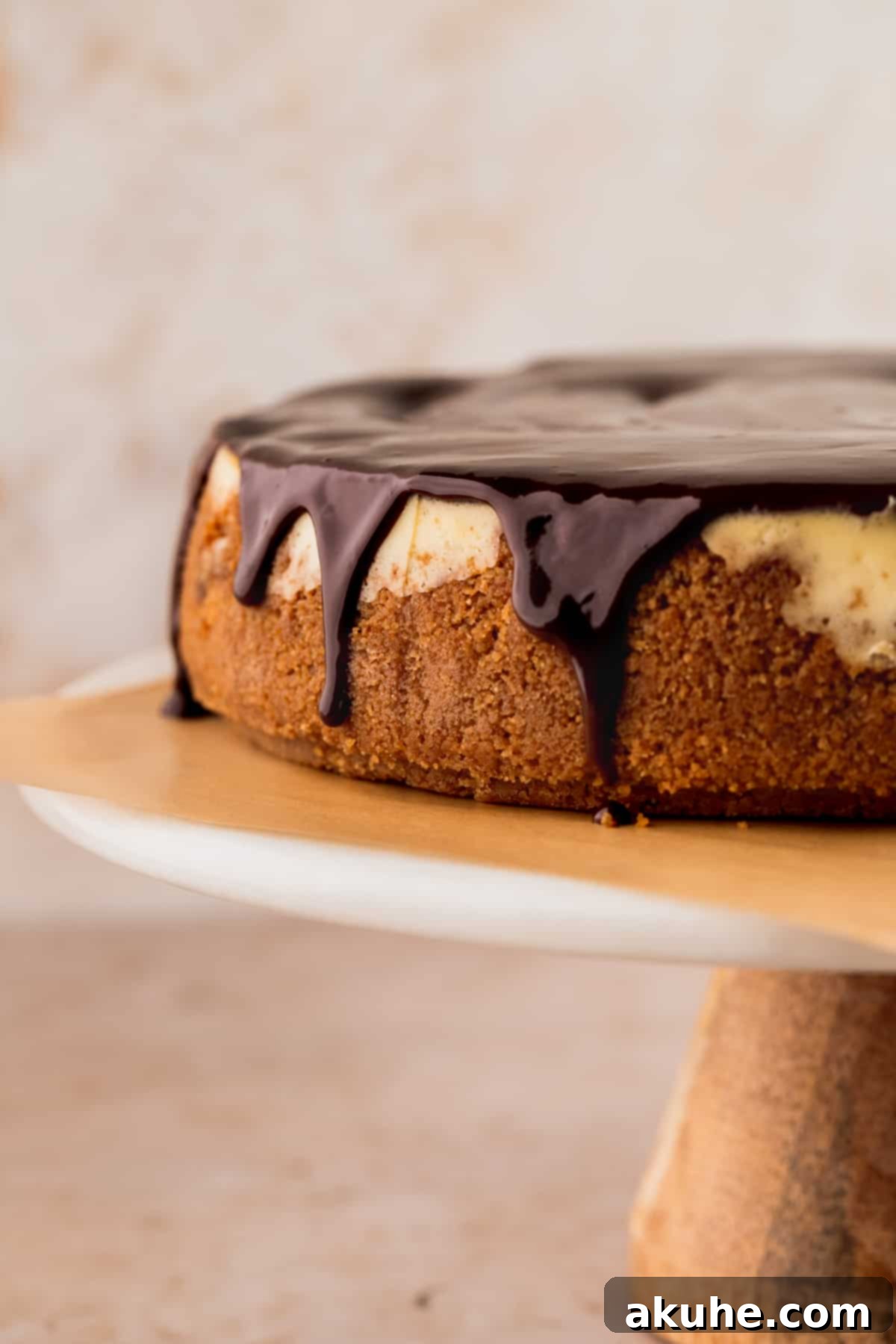 Whimsical Easter Egg Cheesecake 11 Chocolate ganache dripping down the cheesecake.