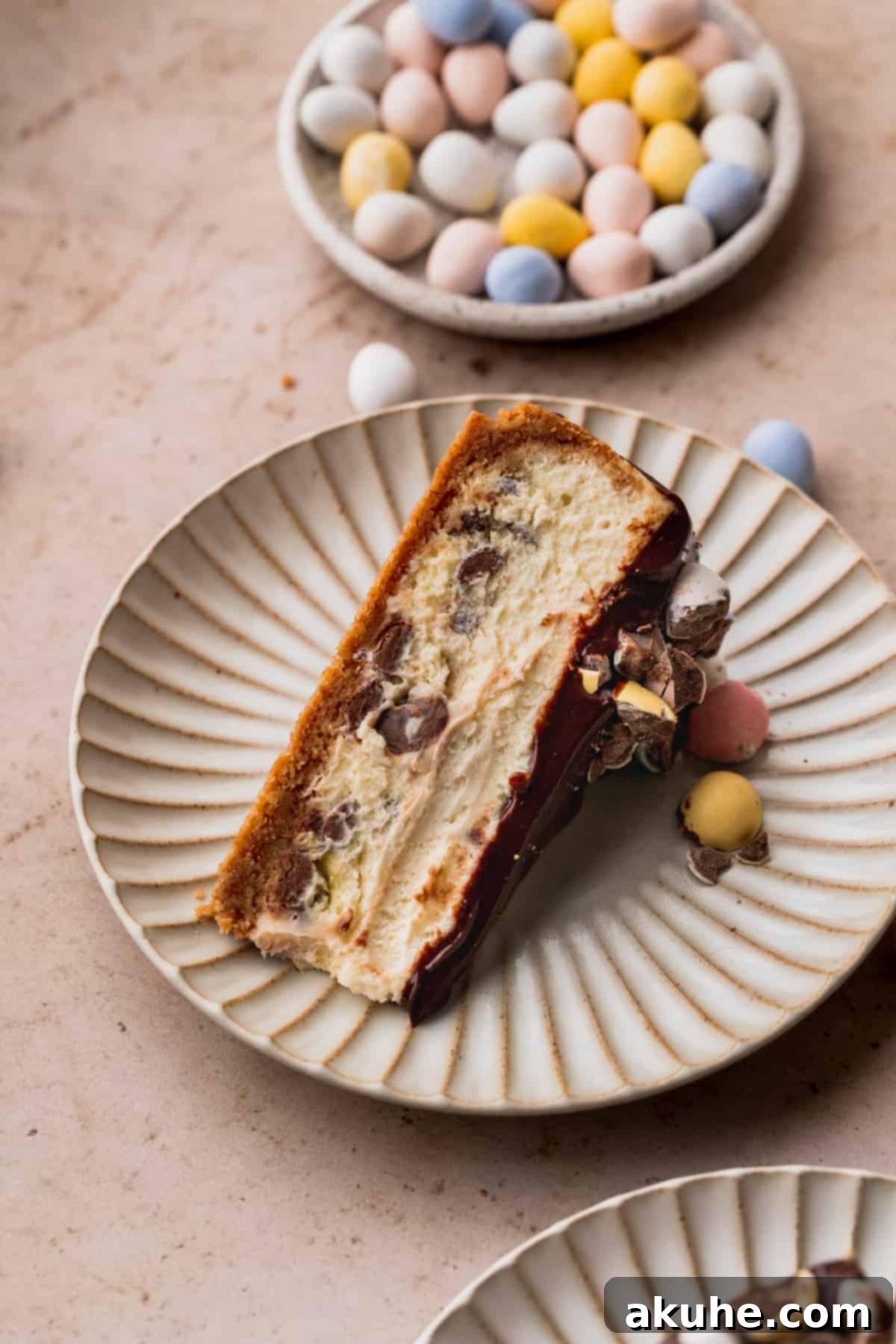 Whimsical Easter Egg Cheesecake 13 One slice of Easter egg cheesecake on it's side on a plate.
