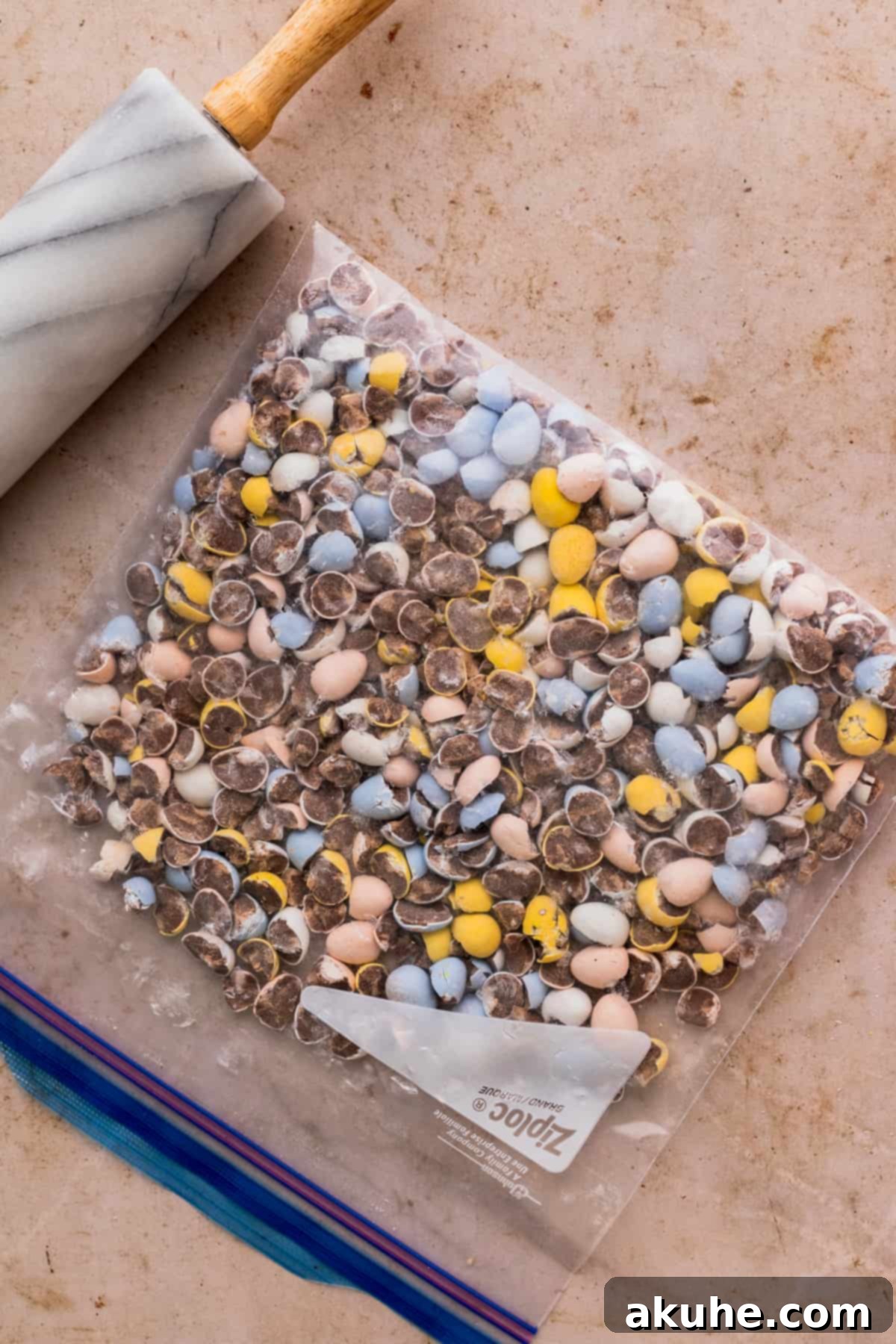 Whimsical Easter Egg Cheesecake 6 Mini eggs in a bag chopped.