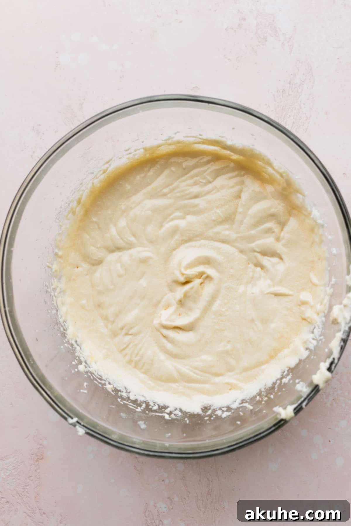 Sweet Strawberry Vanilla Dream 4 Cake wet ingredients in a glass bowl, showcasing the creamy texture.