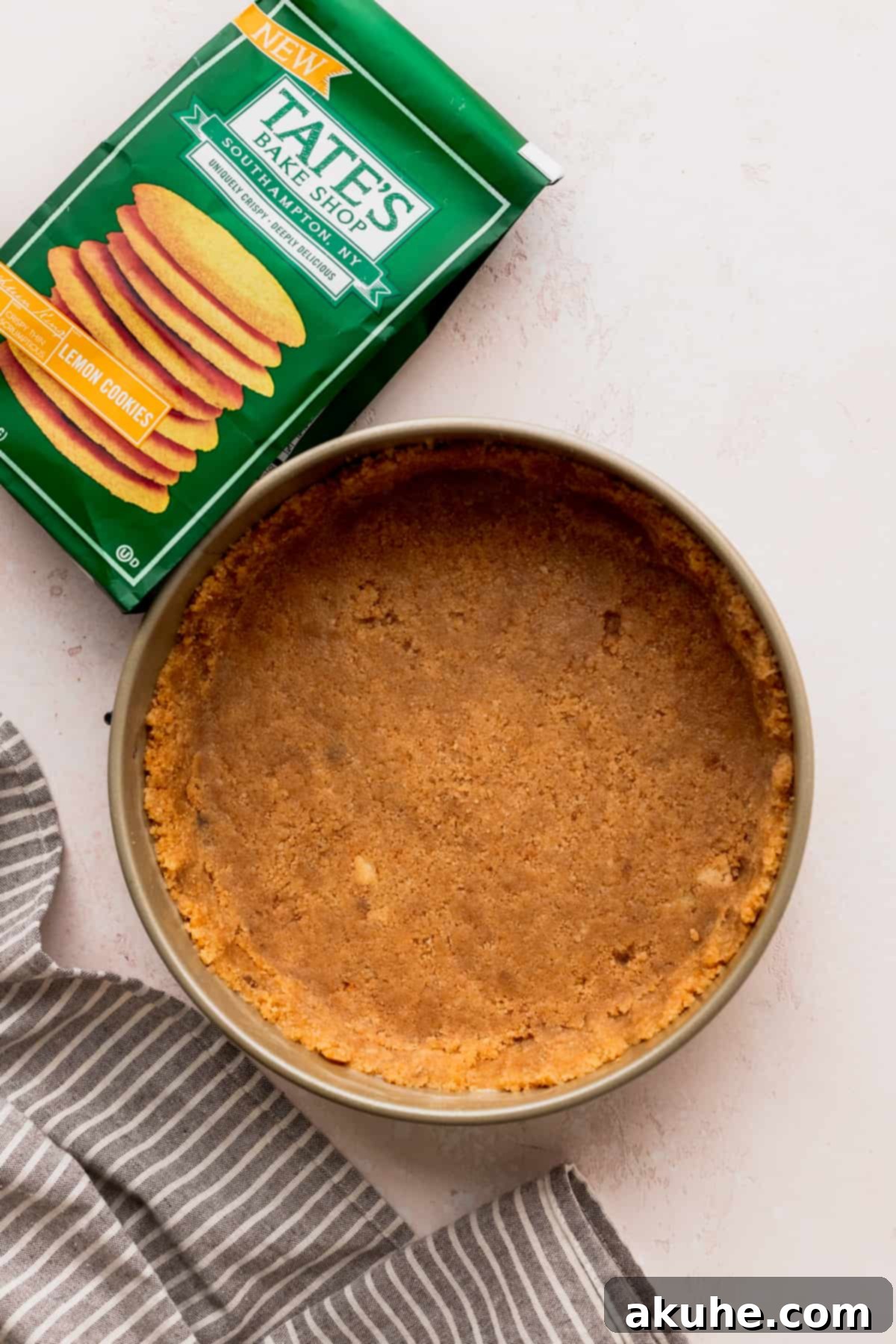 Lemon cookie crust in a springform pan.