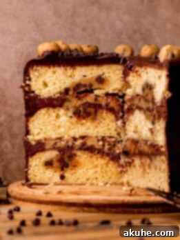 Decadent Cookie Dough Cake 15 Split open cookie dough cake on a platter.