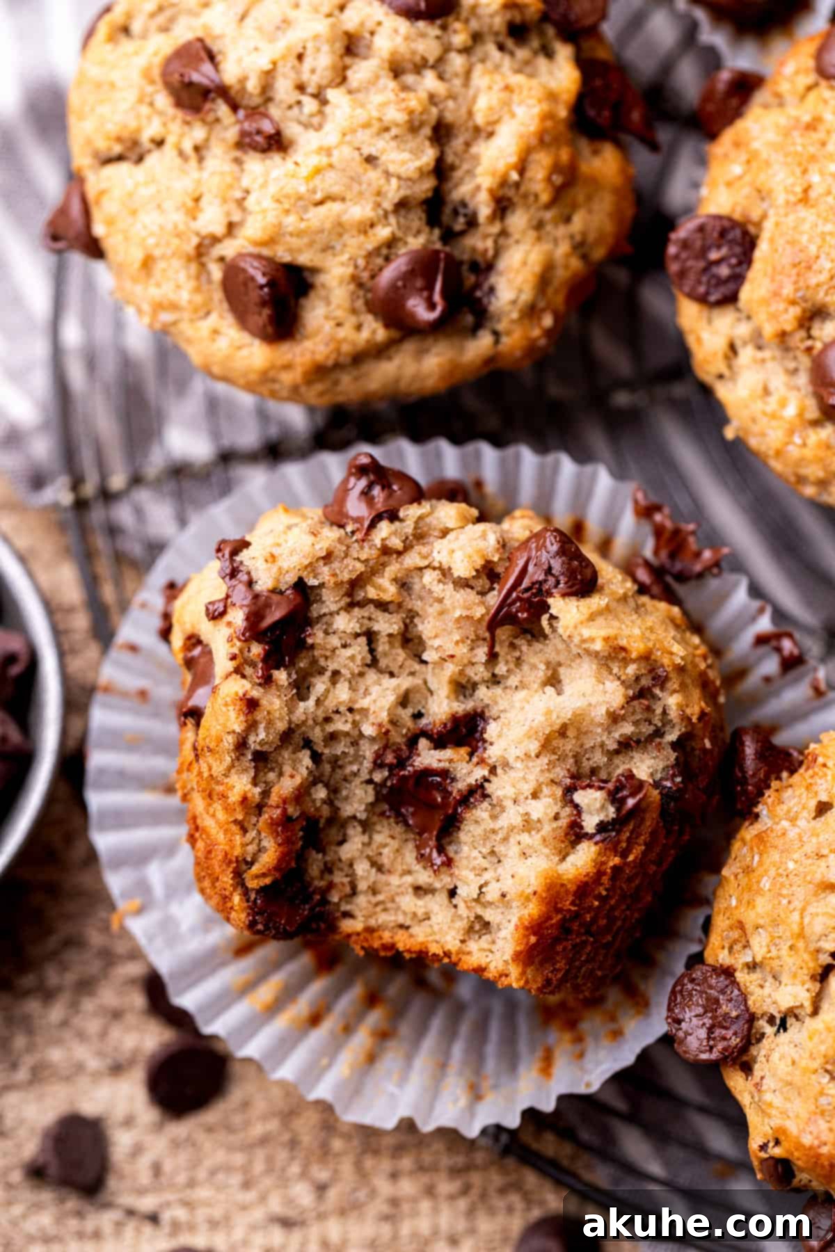 Ultimate Peanut Butter Banana Muffins 2 Bite missing from peanut butter banana muffins.