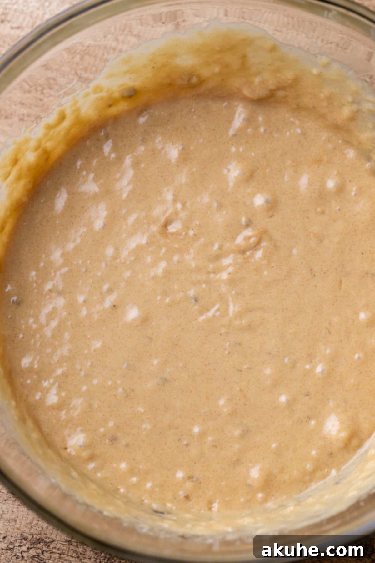 Ultimate Peanut Butter Banana Muffins 4 Wet ingredients in a bowl.