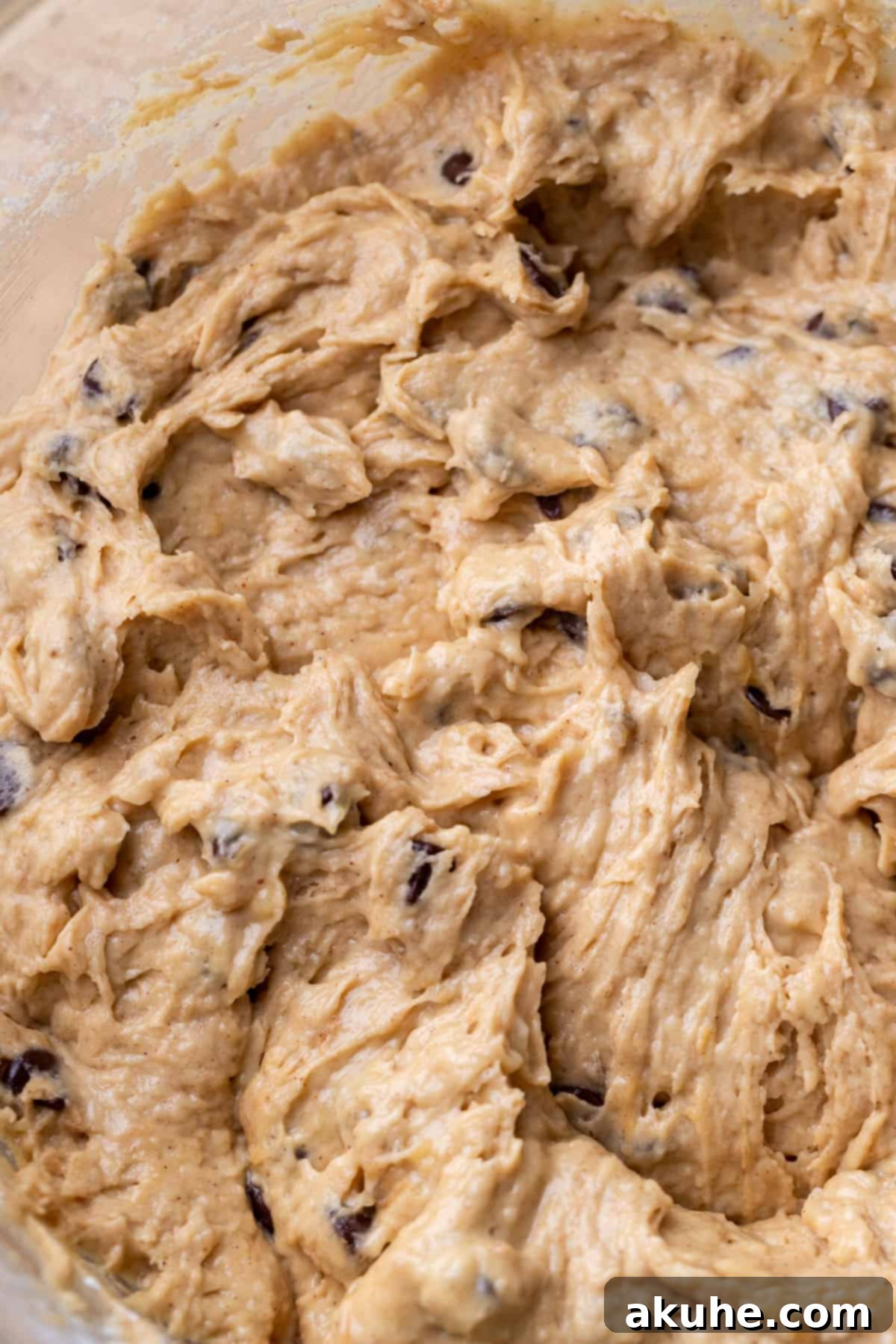 Ultimate Peanut Butter Banana Muffins 5 Muffin batter in a glass bowl.