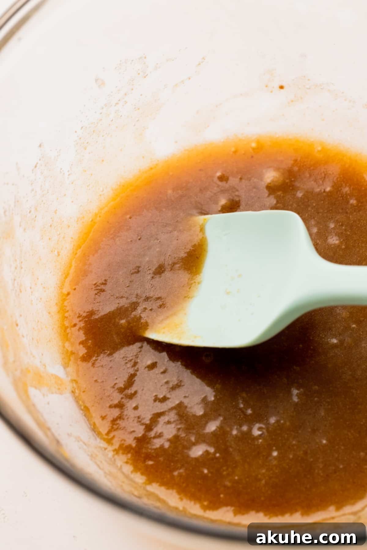 Ultimate Oreo Brookie Indulgence 4 Wet ingredients for Oreo chocolate chip cookie dough in a bowl, ready to be mixed.