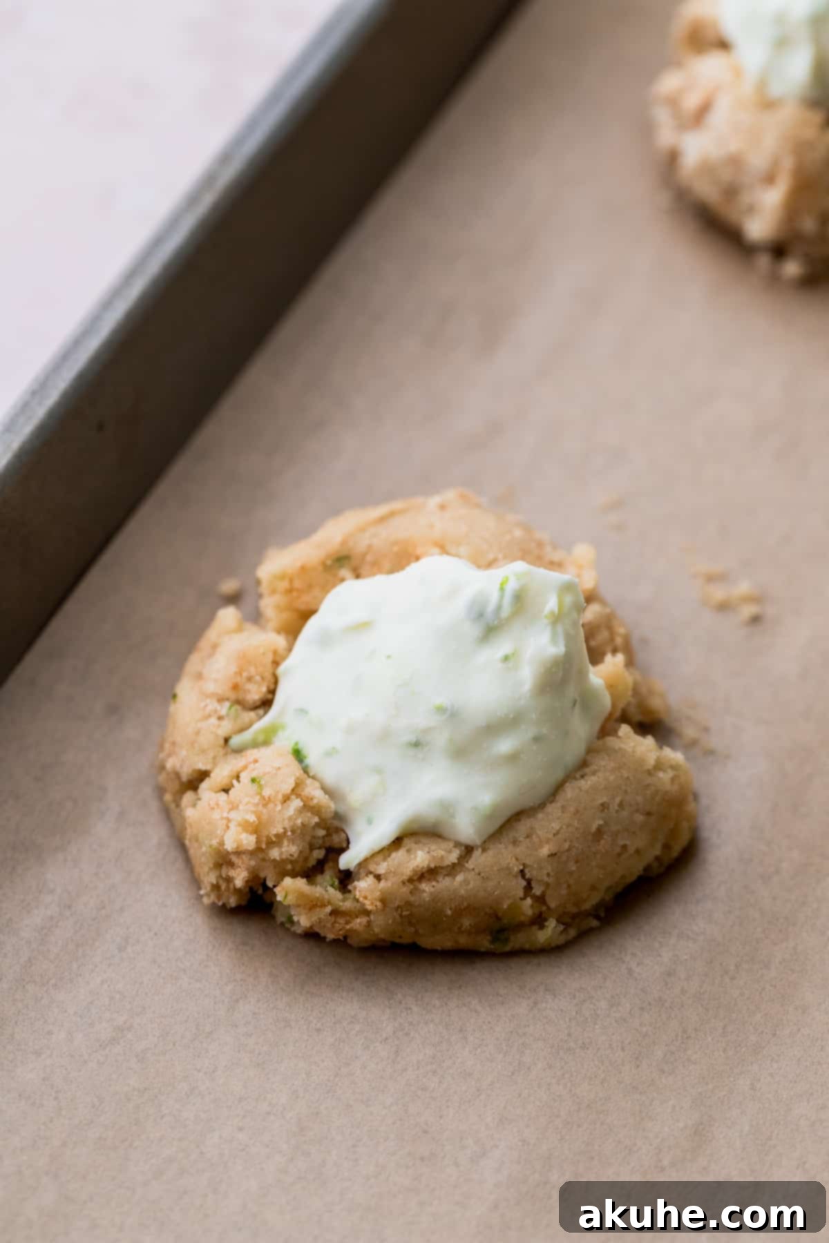 Zesty Key Lime Cookies 9 Frozen cheesecake dollop placed perfectly into the prepared cookie dough ball.