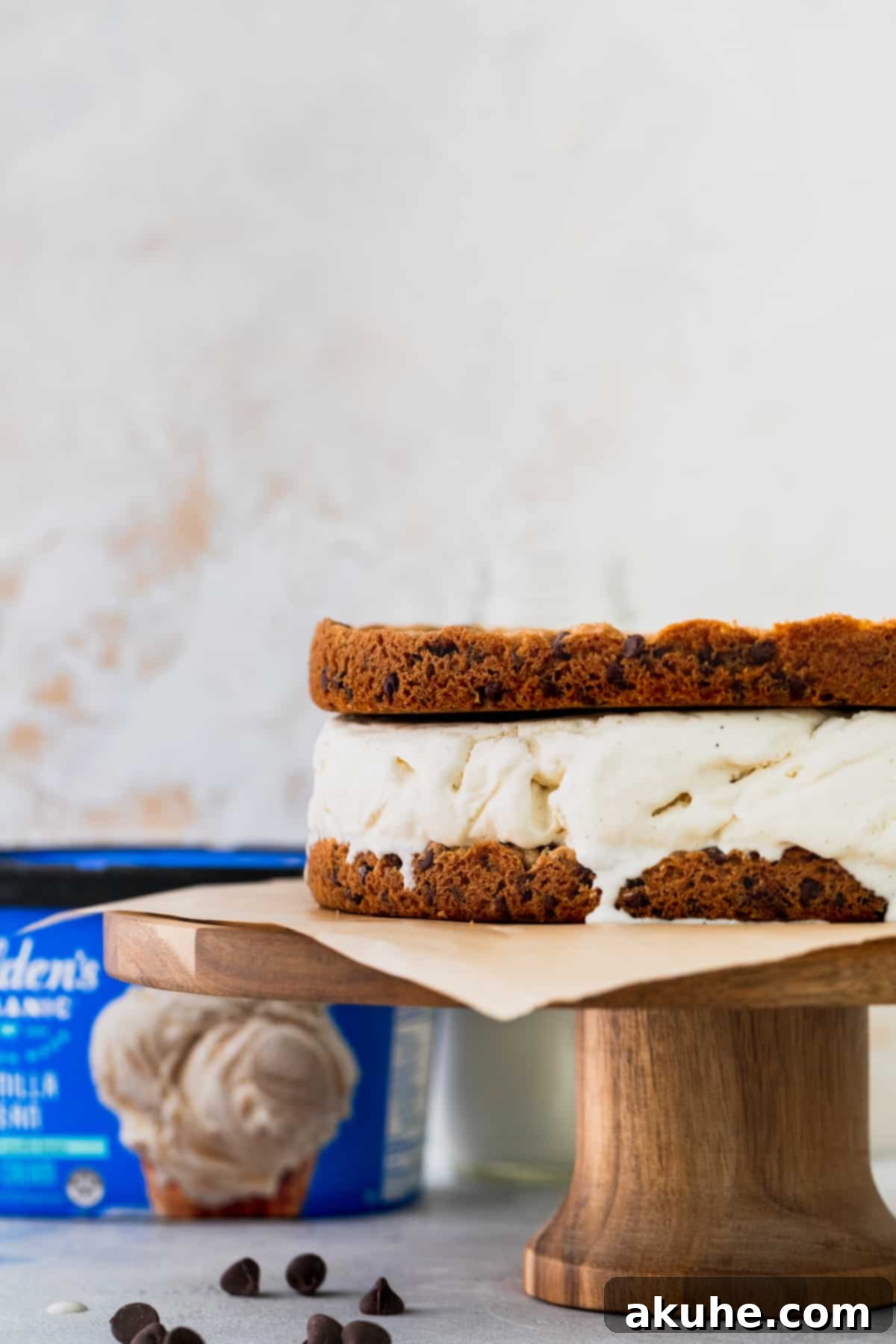 Decadent Cookie Sandwich 3 Large ice cream cookie sandwich displayed beautifully on a cake stand.