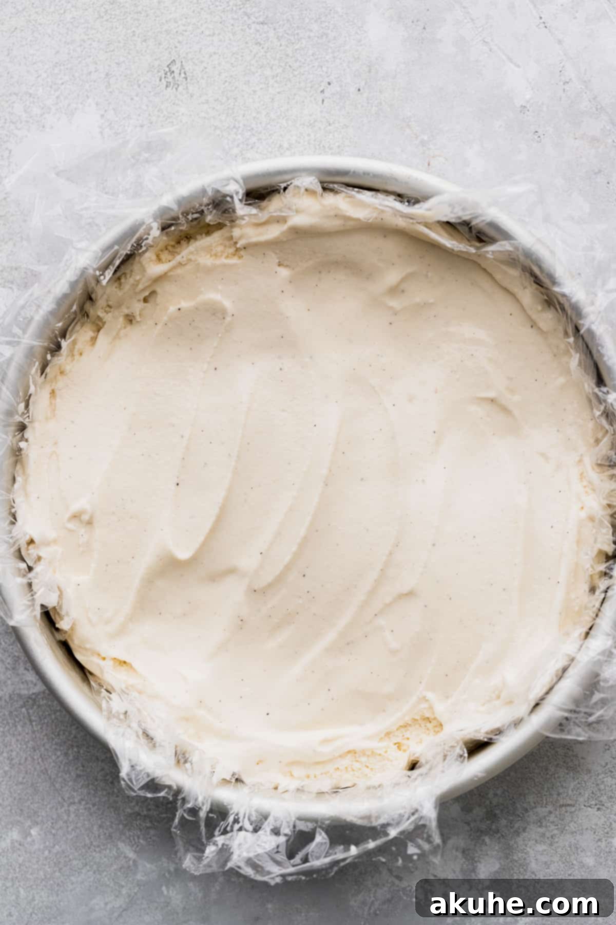 Decadent Cookie Sandwich 4 Vanilla ice cream pressed into a cake pan and ready for freezing.