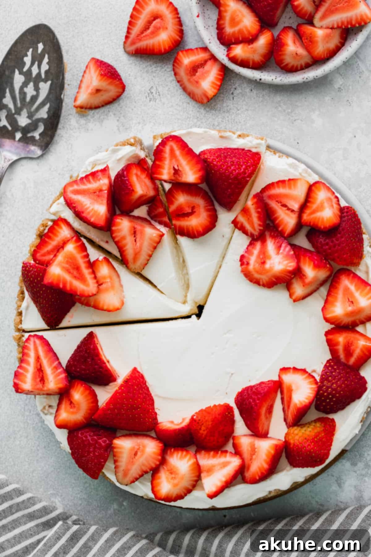 A mesmerizing top-down view of the no-bake vanilla cheesecake, showcasing its perfect round shape and smooth, inviting surface, ready for decoration.