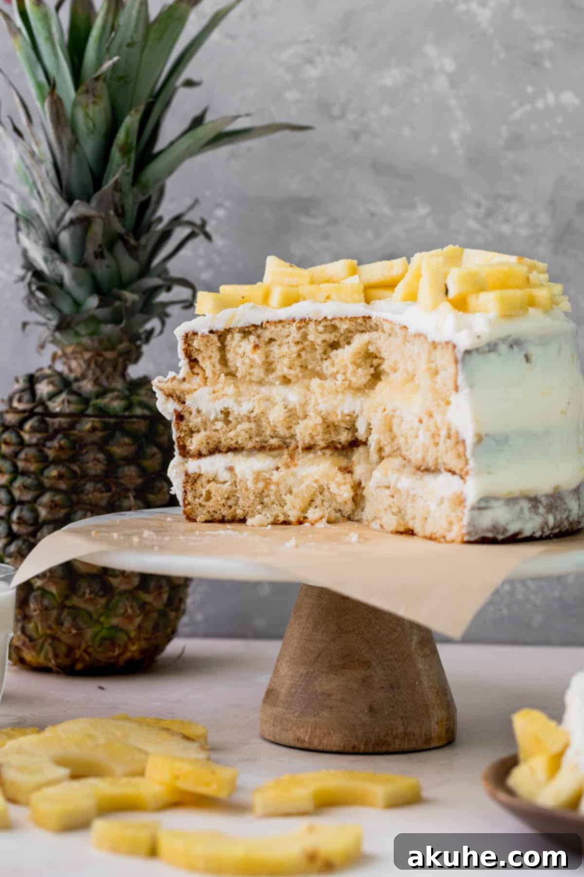 Tropical Pineapple Delight 13 A beautifully decorated Pineapple Sunshine Cake standing proudly on a cake stand.