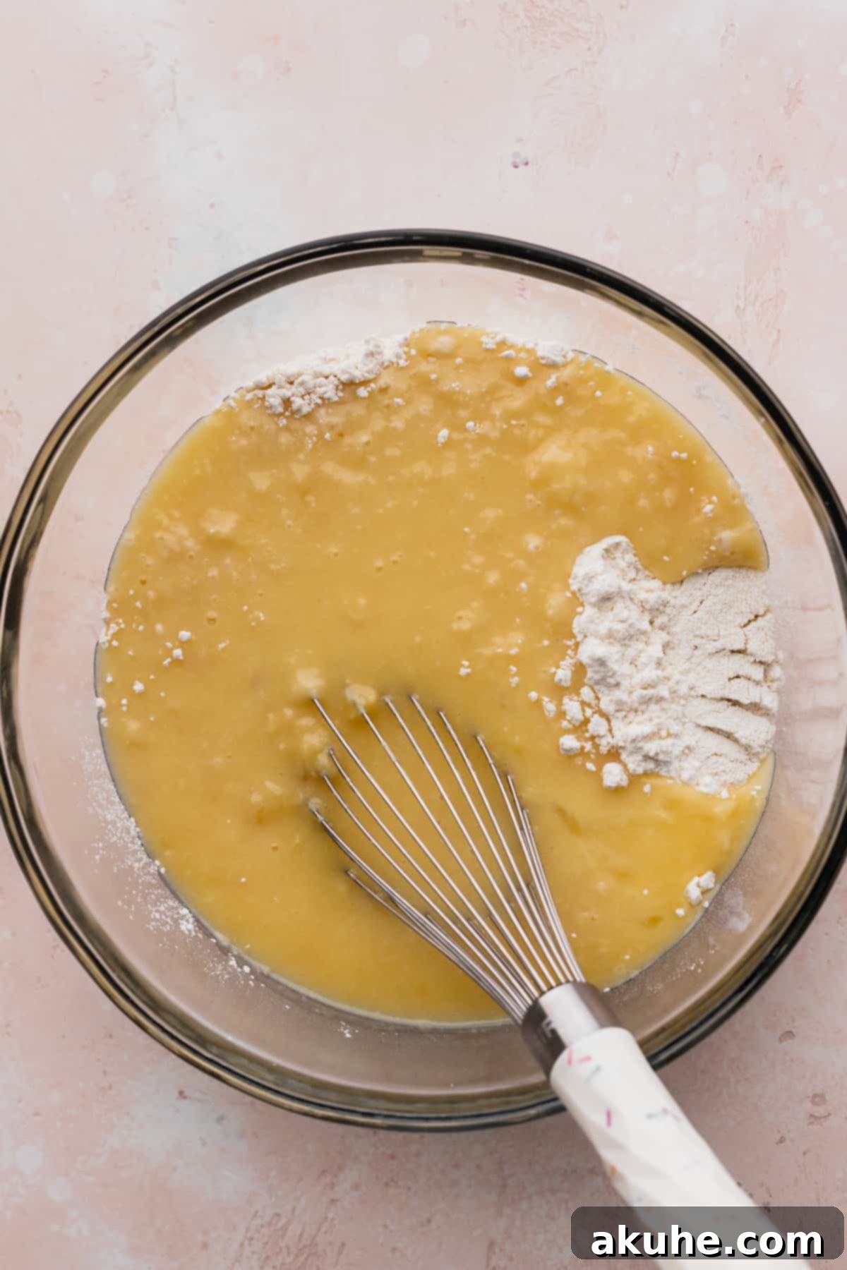Tropical Pineapple Delight 6 Wet ingredients in a bowl, prepared to be mixed with dry ingredients.