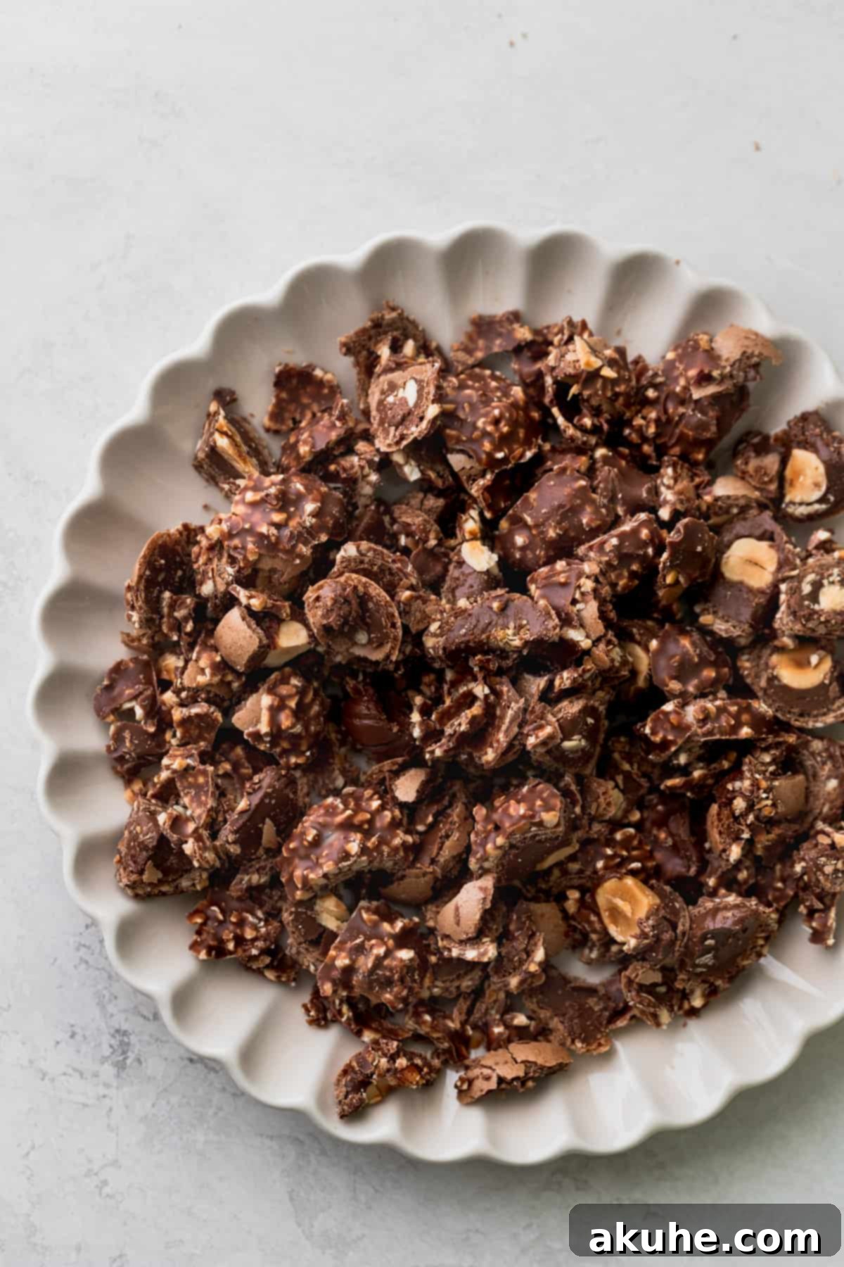 Chopped Ferrero Rocher on a plate.