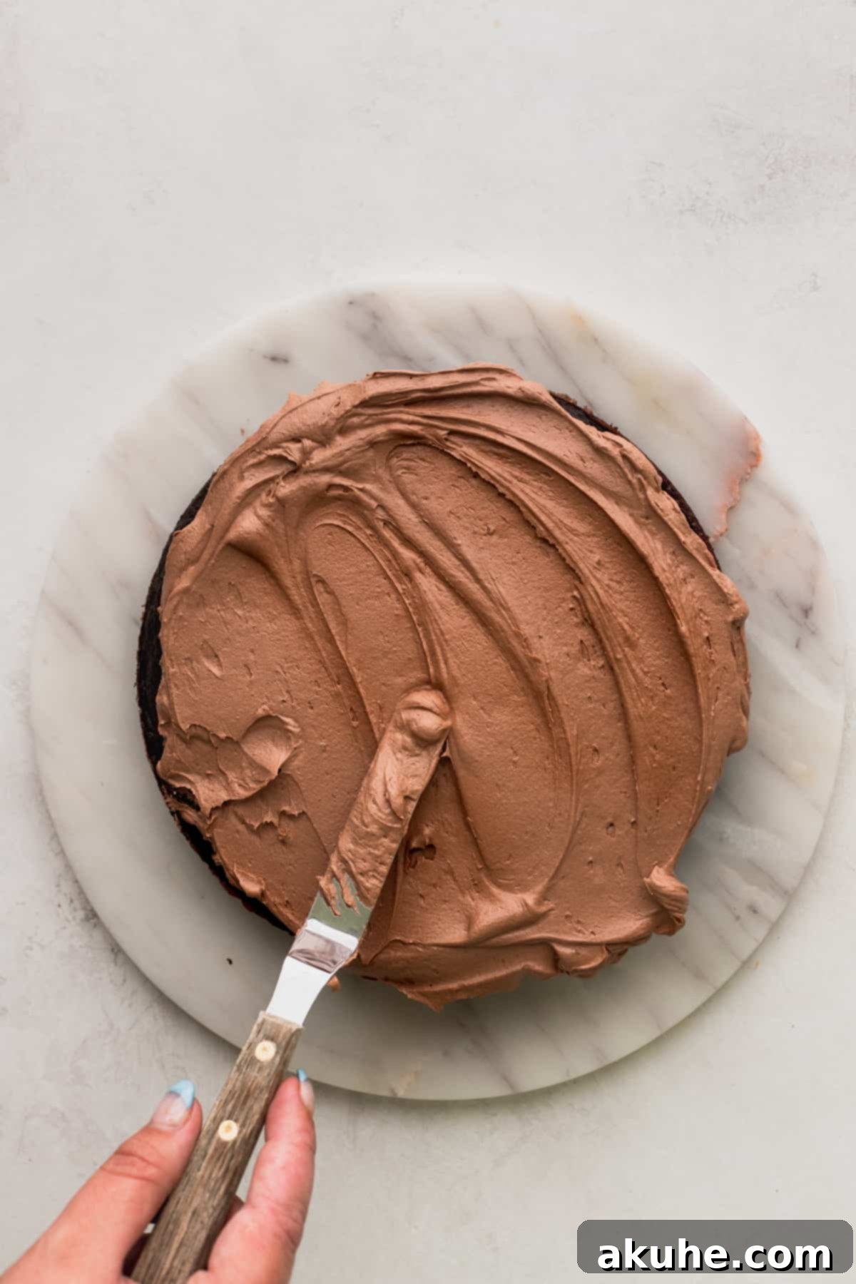 Nutella frosting on top of the cake.