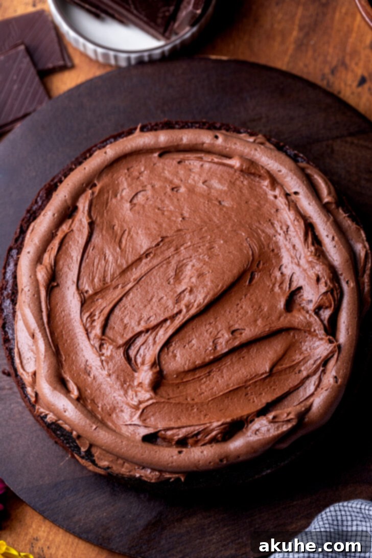 Decadent Triple Chocolate Cake 9 Whipped ganache on top of cake.