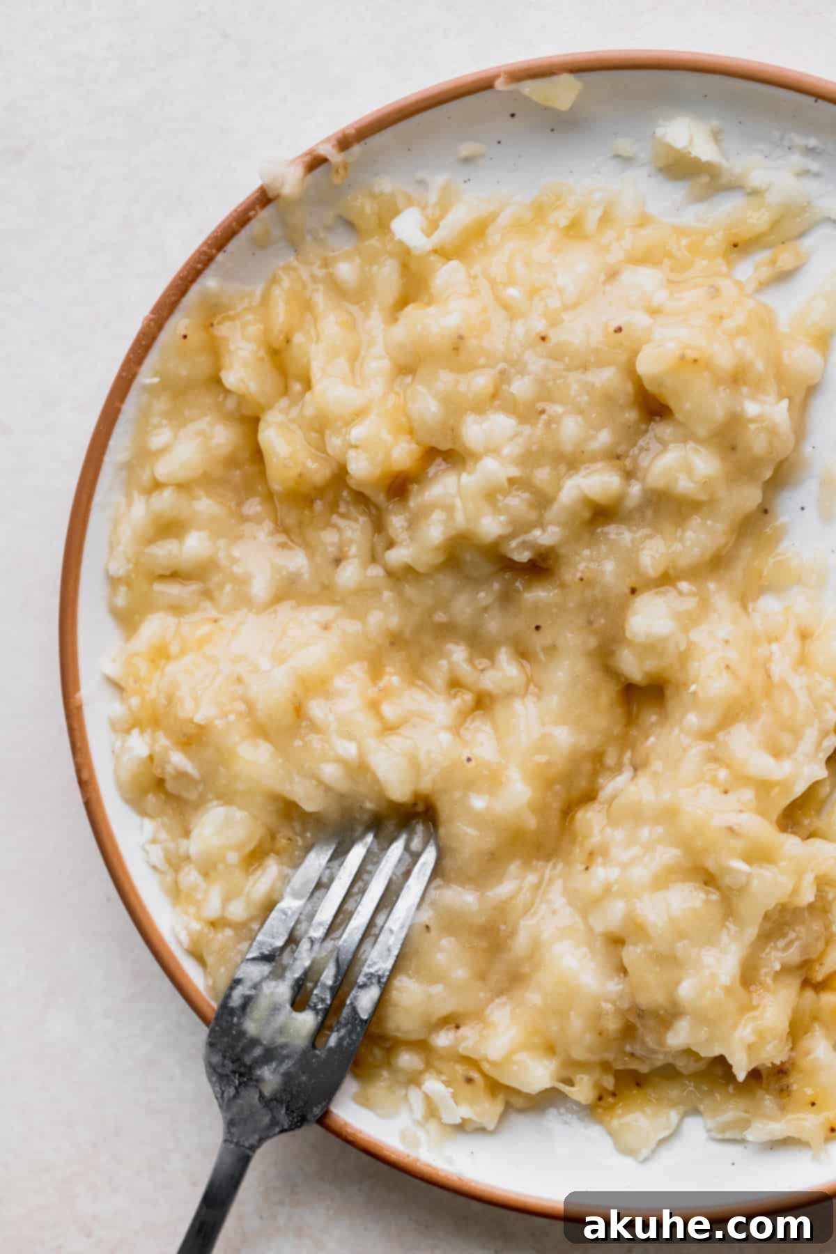 Mashed overripe bananas ready for baking.