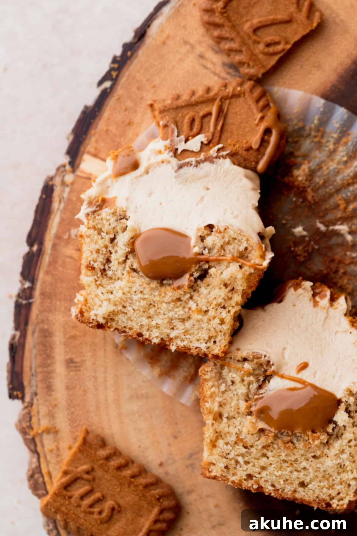 Irresistible Biscoff Cupcakes 12 A Biscoff cupcake neatly split in half, showcasing its tender crumb and rich filling.