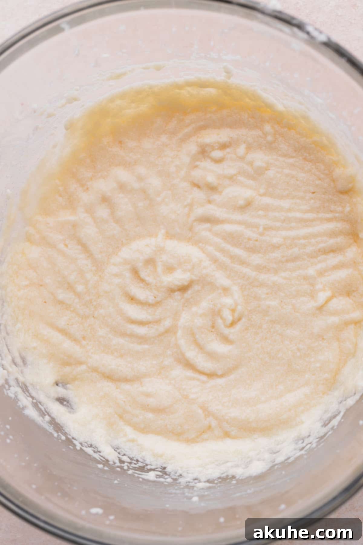 Irresistible Biscoff Cupcakes 5 Wet ingredients in a mixing bowl, showcasing the smooth, creamy consistency.