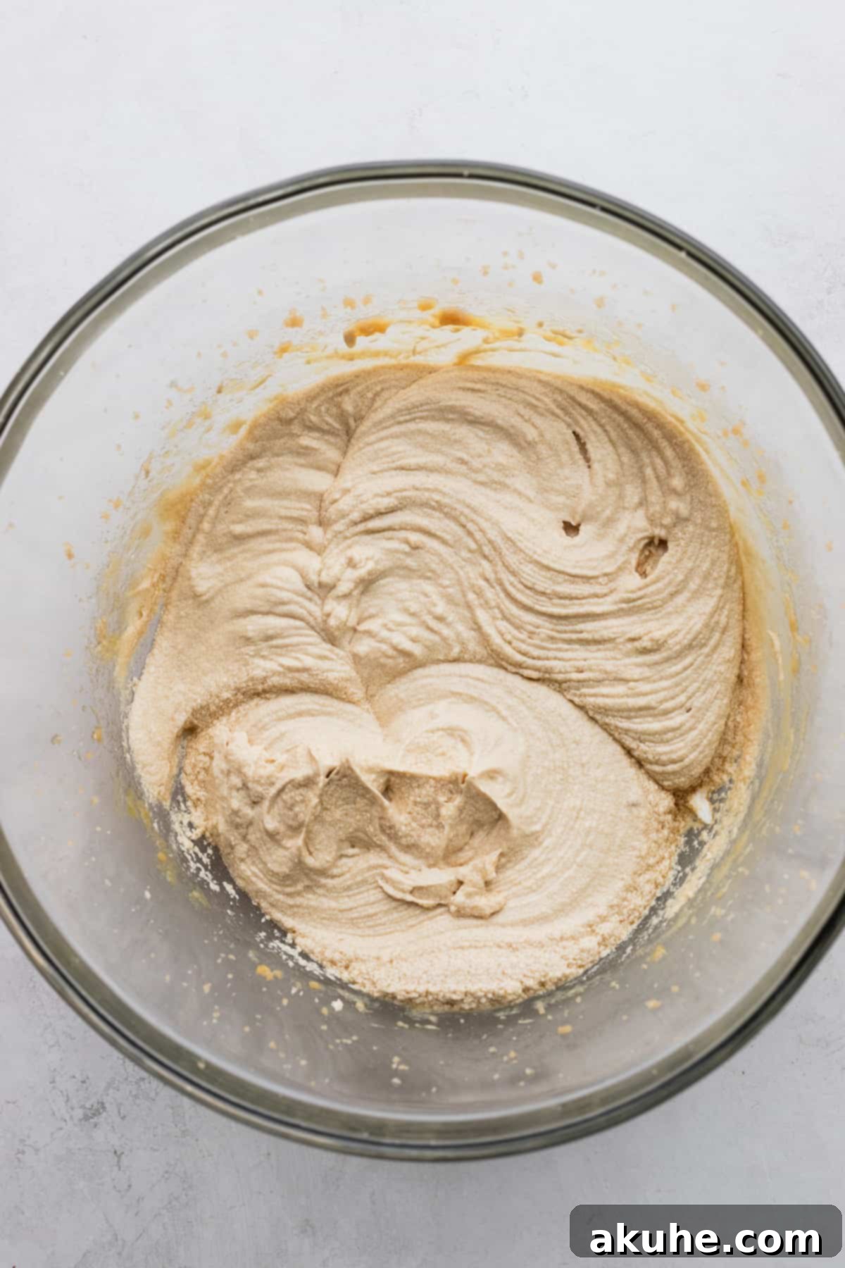 Ultimate Fudgy Crinkle Cookies 4 Whipped butter and sugar in a bowl, light and fluffy.