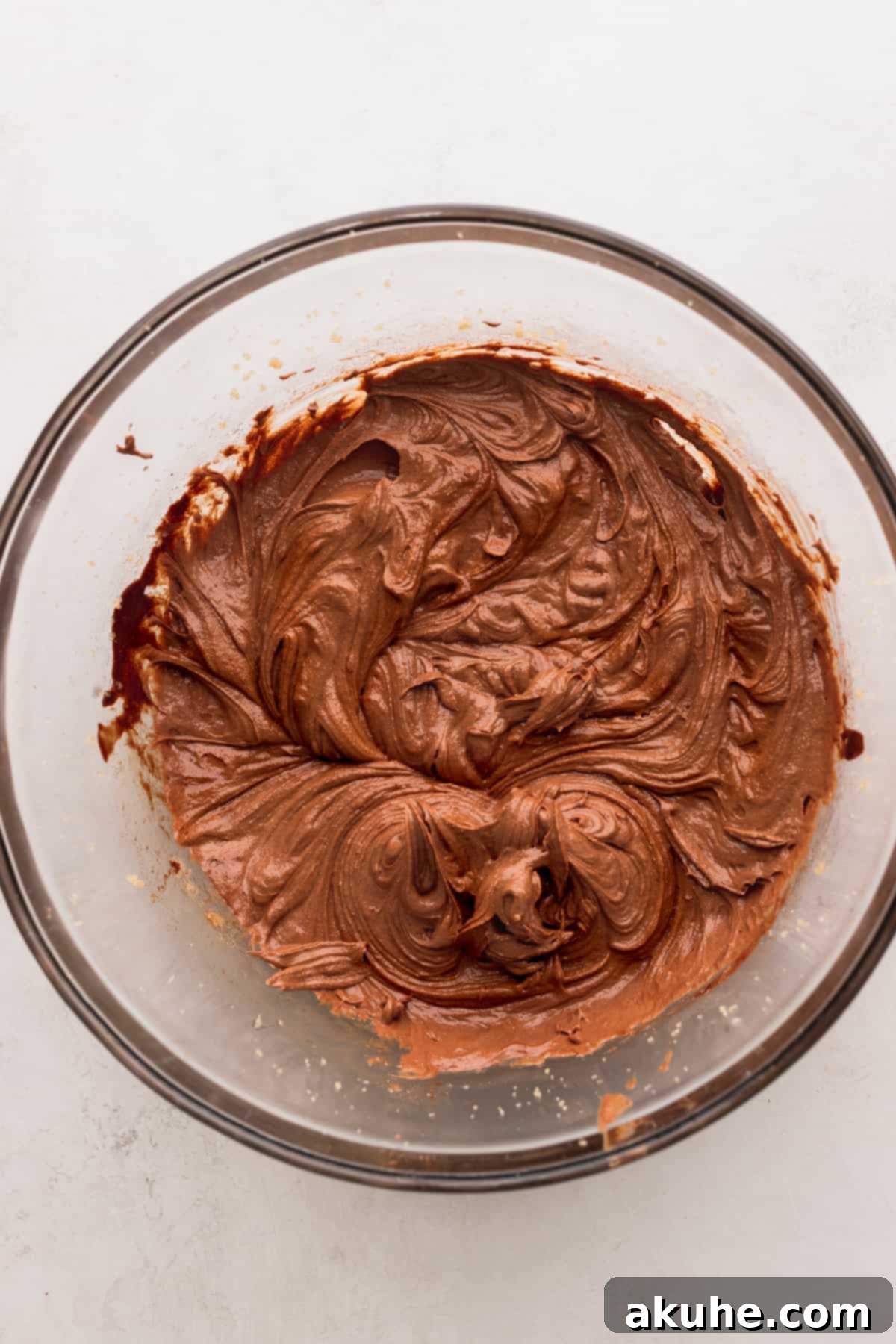 Ultimate Fudgy Crinkle Cookies 5 Wet ingredients in a bowl, well combined and smooth.