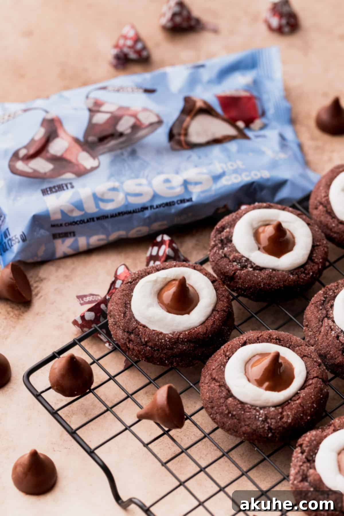 Warm Cocoa Blossom Cookies 11 A cluster of beautifully baked Hot Cocoa Cookie Blossoms arranged artfully on a wire cooling rack, ready to be enjoyed.