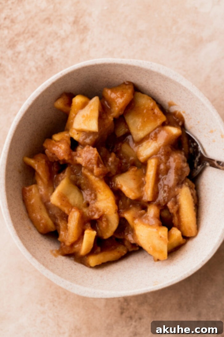 Spiced Apple Pie Cookies 4 Homemade apple pie filling in a bowl, showing tender apple chunks in a thick sauce.
