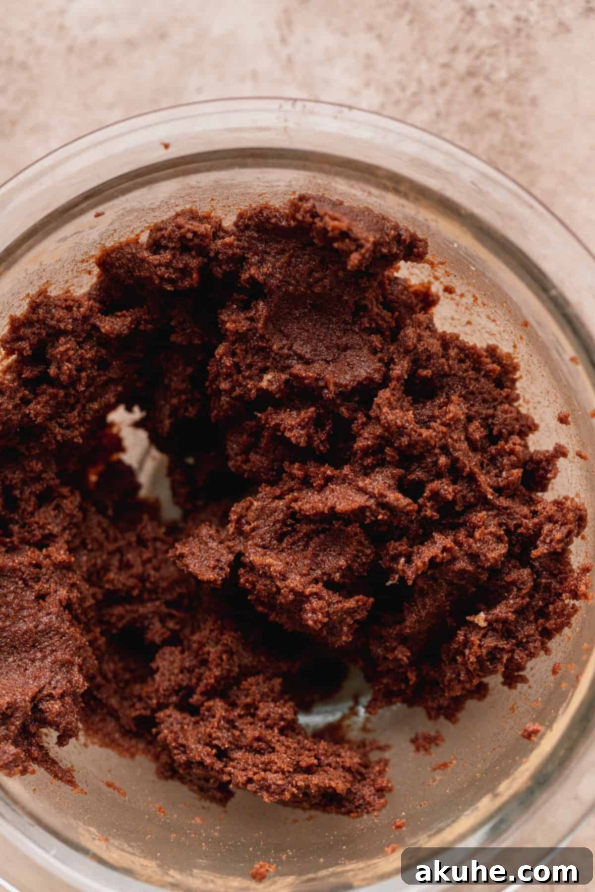 Decadent Caramel Cinnamon Rolls 9 Bowl of rich cinnamon filling, a key component for delicious cinnamon rolls.