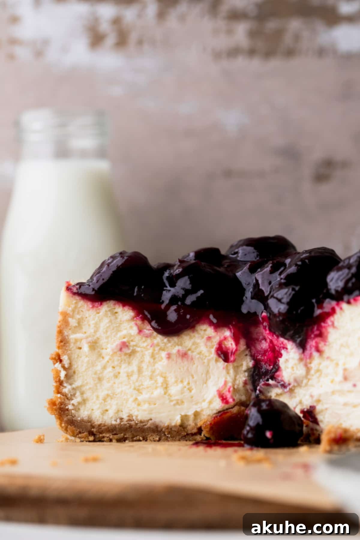 Mini Cheesecakes 13 Close up of a small cheesecake, highlighting its smooth, creamy texture.