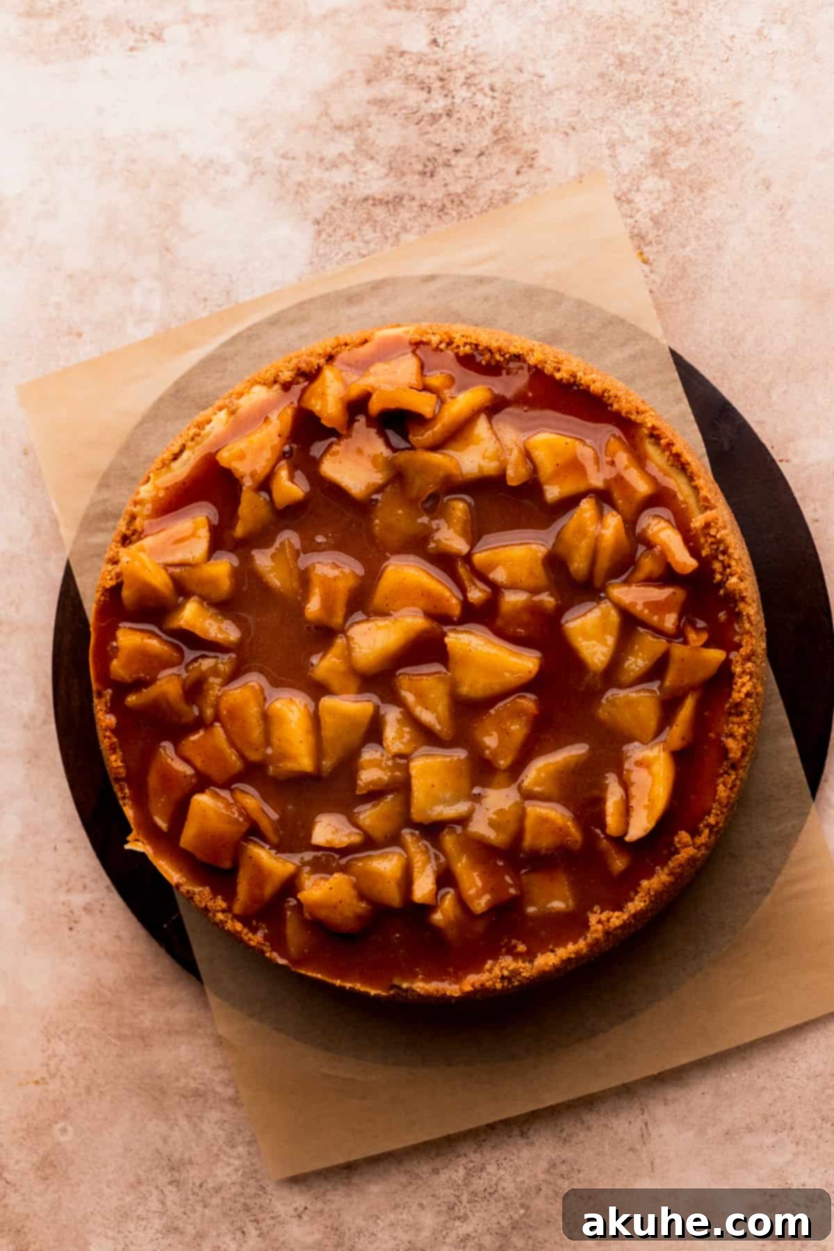 Ultimate Apple Crumble Cheesecake 12 Spiced apple pie topping generously spread over the baked cheesecake.