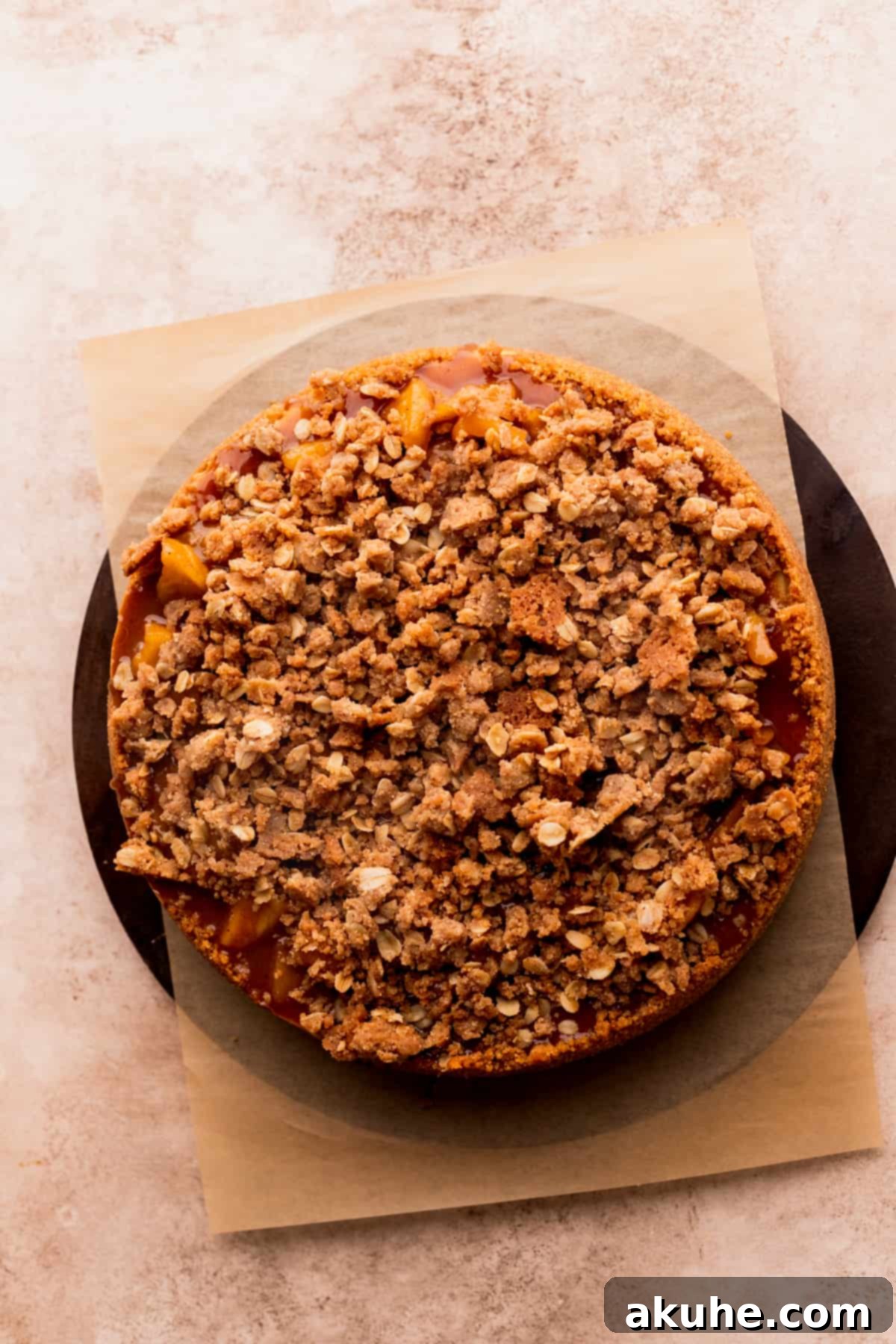 Ultimate Apple Crumble Cheesecake 13 Golden cinnamon oat crumble sprinkled artfully over the apple-topped cheesecake.