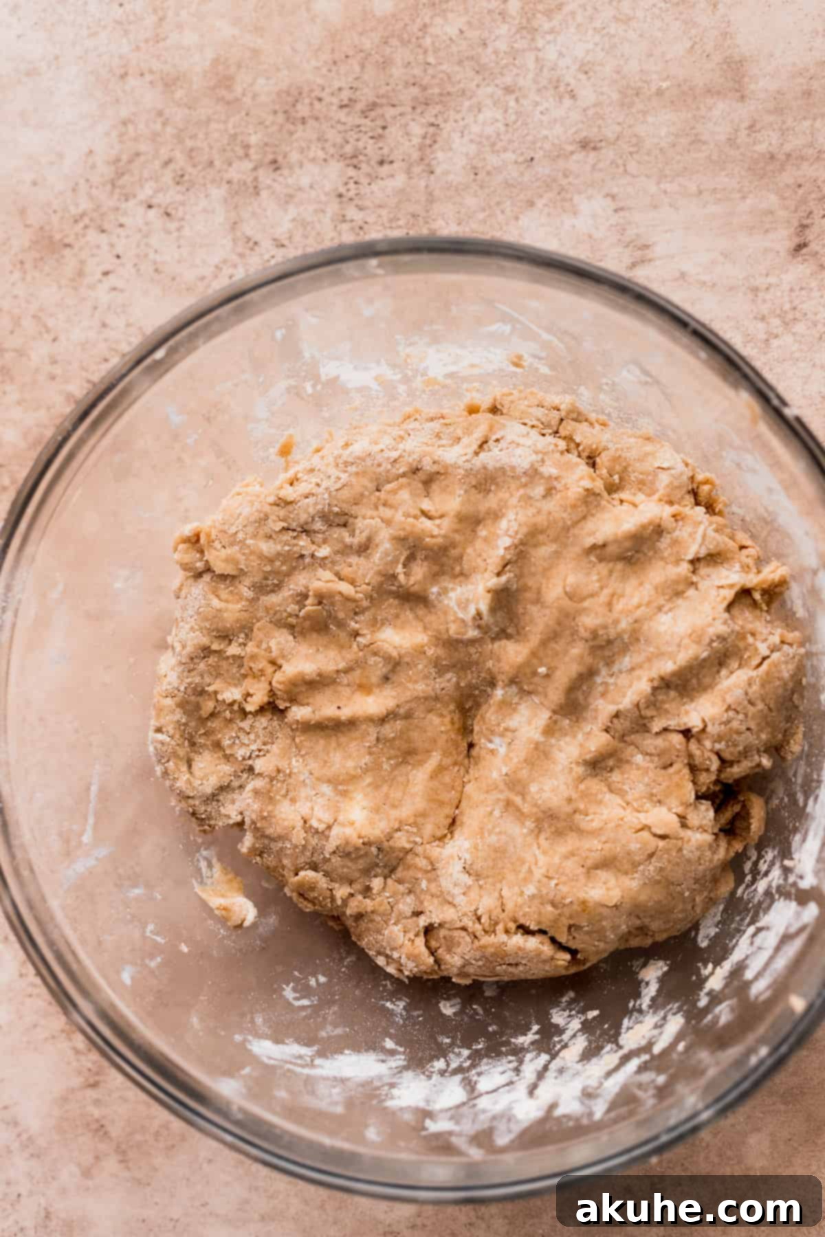 Banana Bread Scones 6 Scone dough coming together in the glass bowl, showing its shaggy texture.