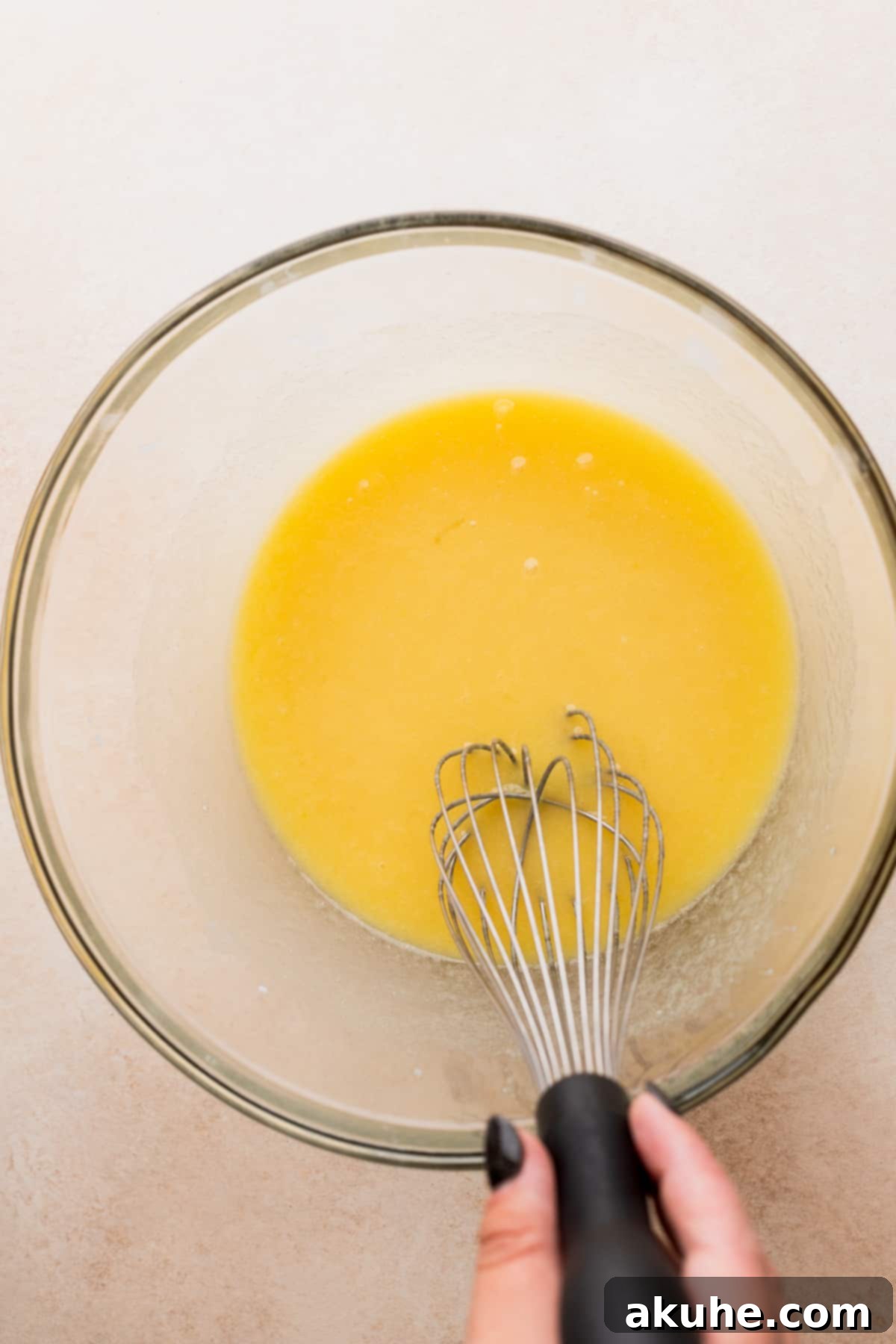 Cookies and Cream Doughnuts 4 Wet ingredients perfectly mixed in a bowl, ready for combining.