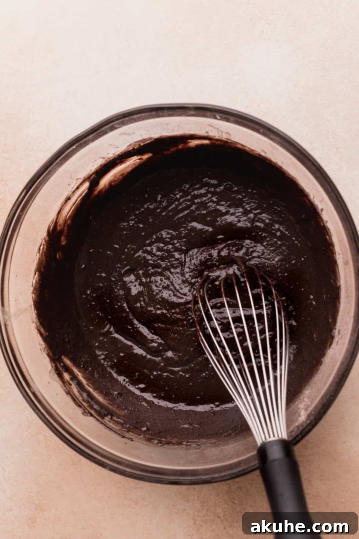 Cookies and Cream Doughnuts 5 Donut cake batter smoothed evenly in a glass pan before baking.