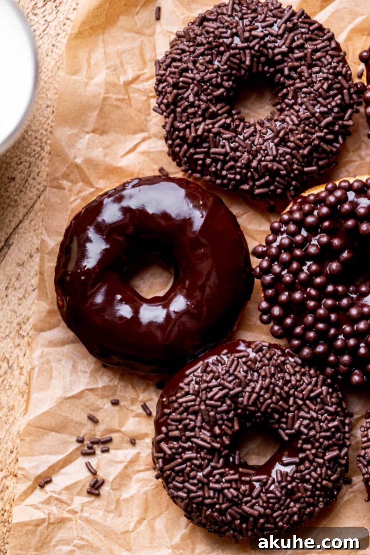 Decadent Chocolate Donut Delights 2 Top view of classic chocolate glazed donuts, showcasing their rich, dark glaze and inviting texture.