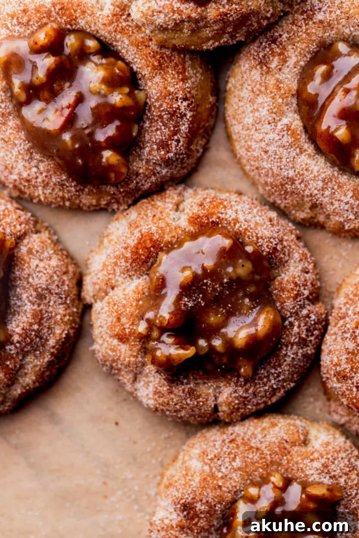 Southern Pecan Pie Cookies 12 Close up of a pecan pie cookie, highlighting its texture and the rich filling.