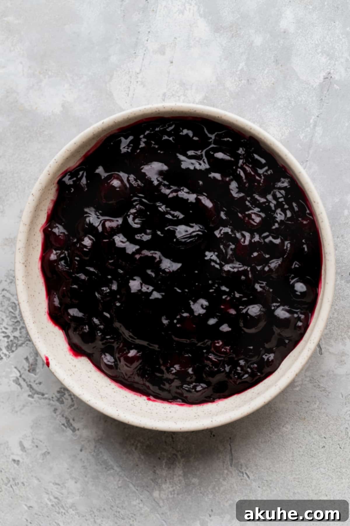 Decadent Cherry Cheesecake 4 Cherry filling in a bowl.