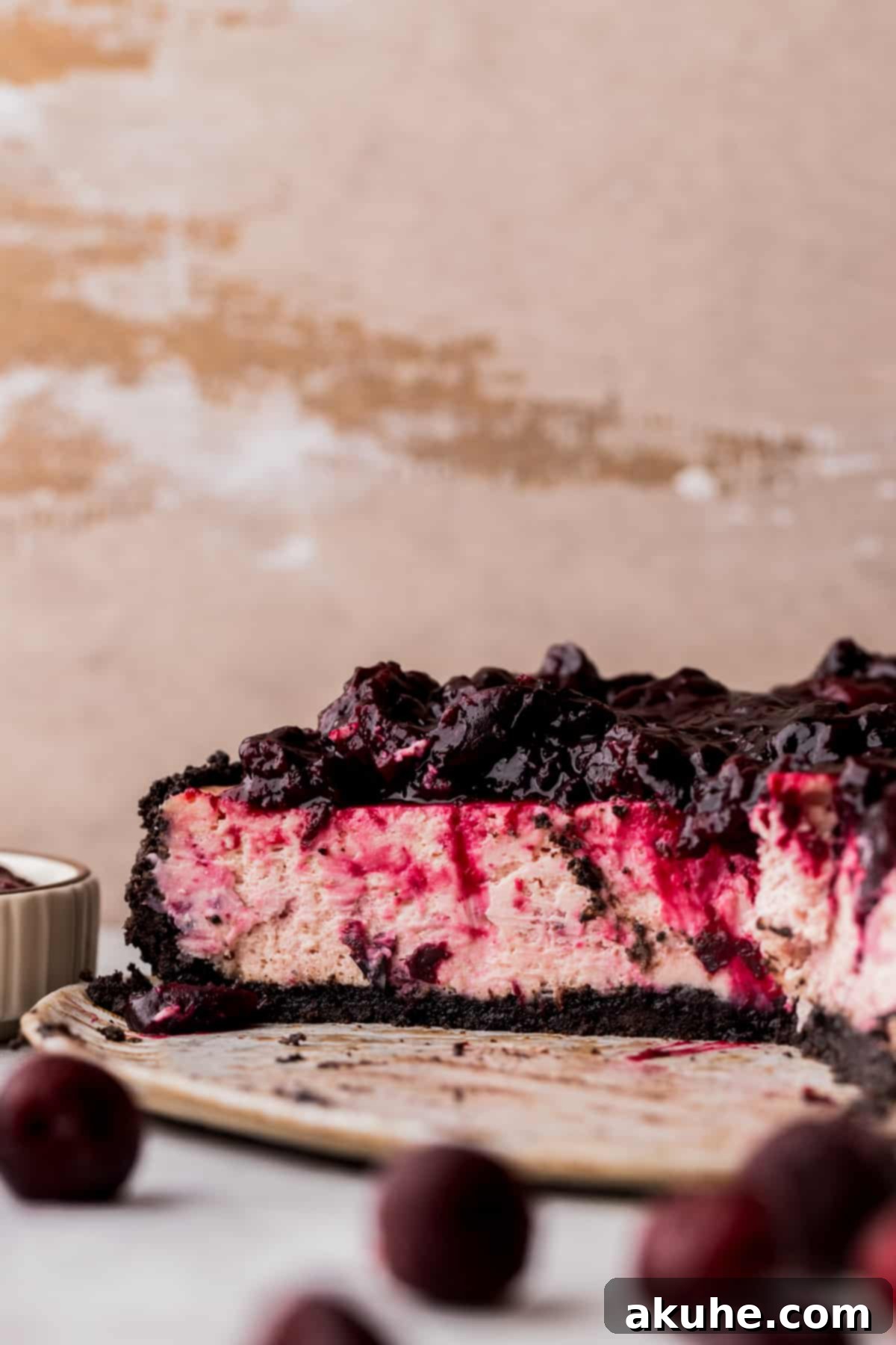 Decadent Cherry Cheesecake 9 Cheesecake on a platter.