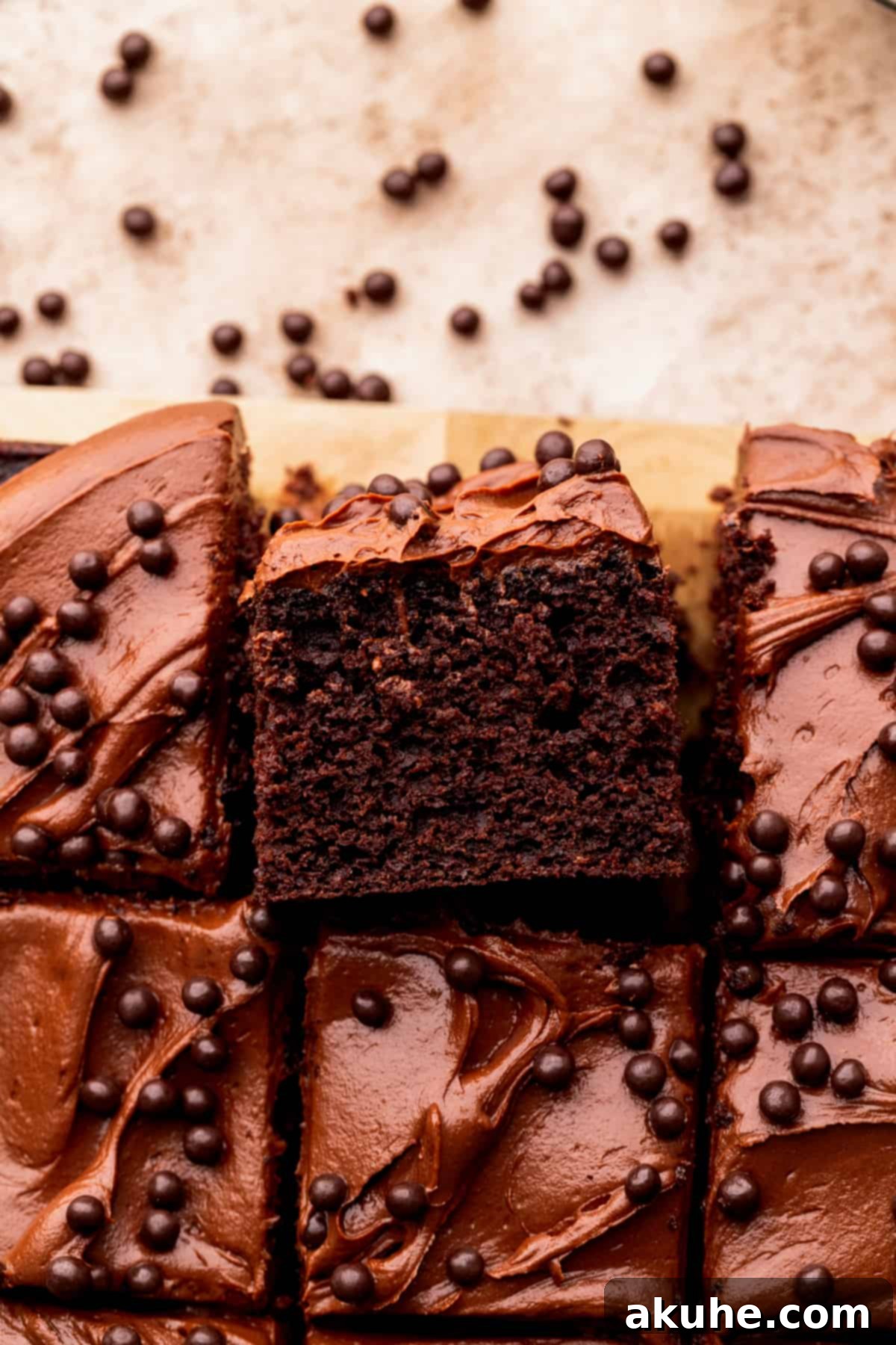 Velvet Chocolate Ganache Torte 3 A slice of moist chocolate ganache cake resting on its side, revealing its rich layers.