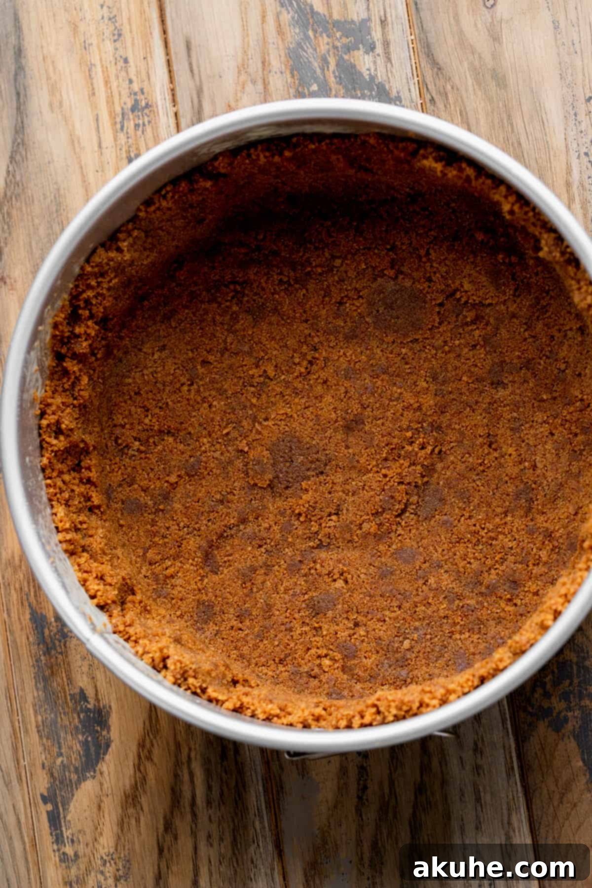 Gingerbread Dream Cheesecake 6 Cookie crust in the pan.