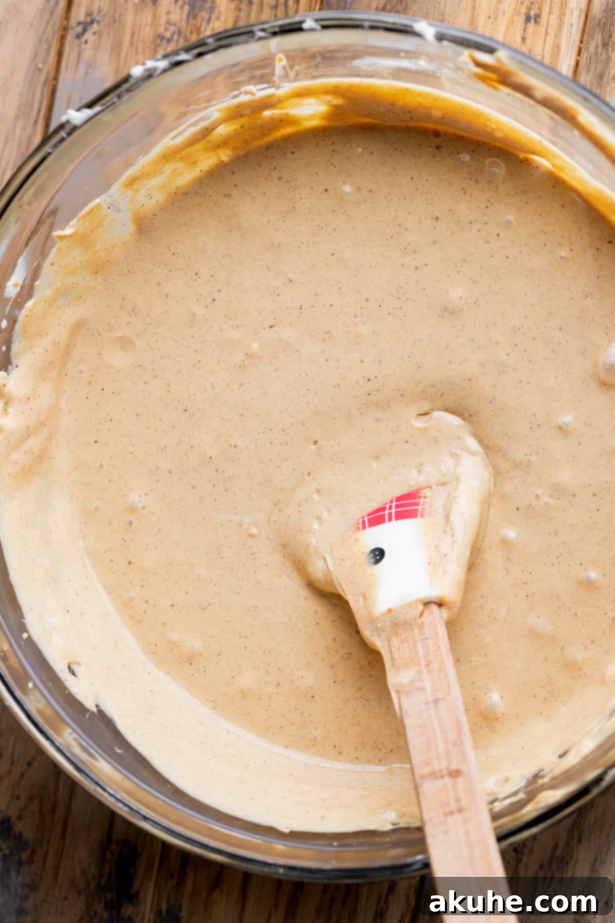 Gingerbread Dream Cheesecake 8 Cheesecake batter in a glass bowl.