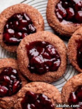 Decadent Chocolate Cherry Cookies 11 Cherry cookies on a wire rack.